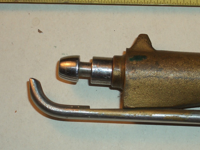 This picture is showing the mechanism in the uncocked or fired position.